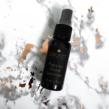 Load image into Gallery viewer, Papyrus Hand Sanitizer bottle displayed on a white and rose gold marble