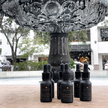 Load image into Gallery viewer, 6 bottles of Pure papyrus diffusing oil, pure Sakkara diffusing oil and pure Egyptian musk diffusing oil displayed on a stone background