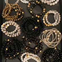 Load image into Gallery viewer, Anuket fragrance diffusing bracelets displayed on a sparkly dish