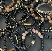 Load image into Gallery viewer, Anuket fragrance diffusing bracelets displayed on a sparkly dish