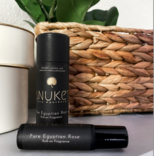 Load image into Gallery viewer, Pure Egyptian Rose Roll-On Fragrance bottle laying in front of Pure Egyptian Rose Roll-On Fragrance box on a straw vase background