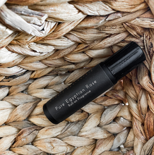 Load image into Gallery viewer, Pure Egyptian Rose Roll-On Fragrance bottle on a braided straw background