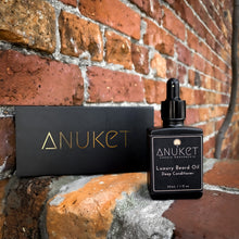 Charger l&#39;image dans la galerie, Luxury beard oil deep conditioning bottle and black Anuket box displayed on a brick background