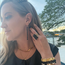 Load image into Gallery viewer, Anuket owner wearing Noir CZ Gold Stud Earrings